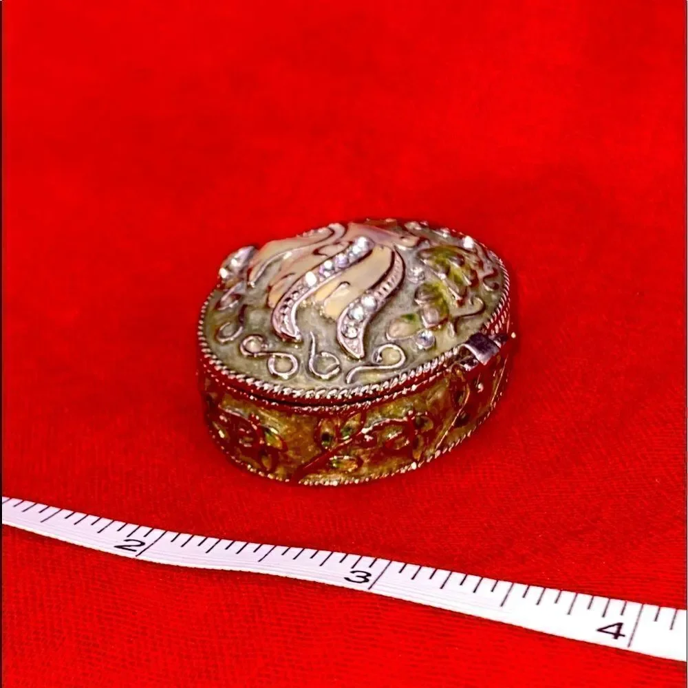 Vintage trinket box by Monet with extreme detail work and w/semi precious stones